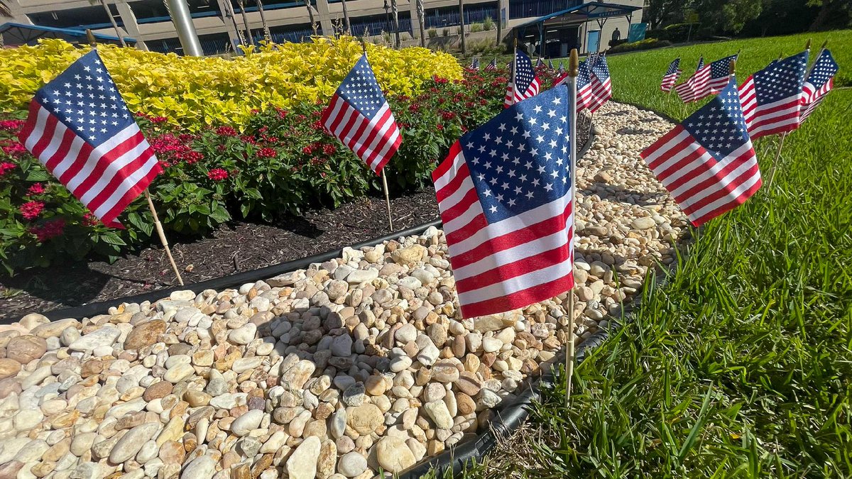 BaptistHealthJx's tweet photo. Today, team members from #BaptistJax, @WolfsonChildren and @Nemours came together for a special remembrance event in memory of the 25th anniversary of September 11, honoring the nearly 3,000 lives lost, the families forever changed and the first responders who ran toward danger. 💙
We remember the uncertainty, the heartbreak and the way our nation came together in the days that followed. But we also remember September 12 - the day we woke up to a changed world and asked, "What do we do now?"
People showed up for one another. Neighbors checked on neighbors. Strangers offered comfort. Communities came together to serve, volunteer and help where they could. 🏡 🫶
That spirit of compassion and service continues to live on, including in health care. Every day, health care teams meet people in some of the most vulnerable moments of their lives. Beyond medicine and technology, it's compassion, kindness and simply being there that can remind someone they are not alone.
❤️ 🇺🇸 Today, we remember. We honor. And we move forward together.