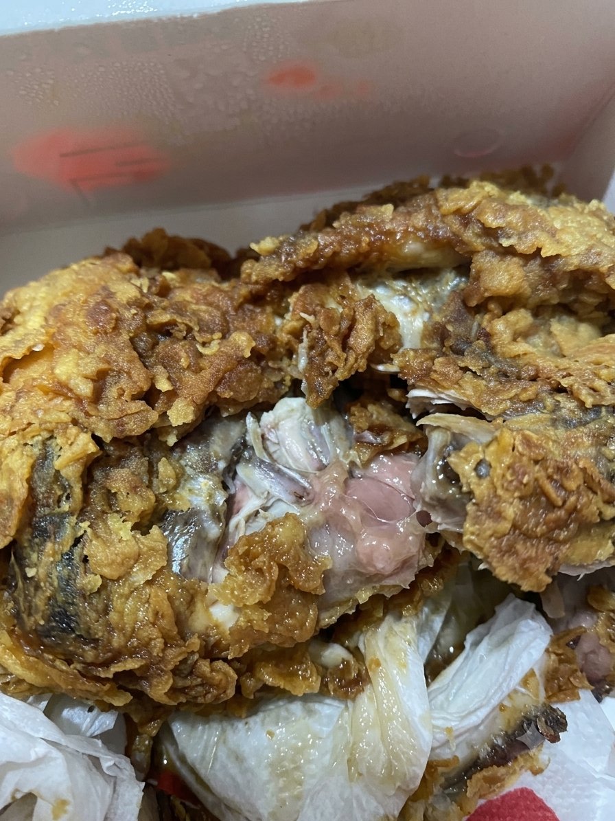Amul0369's tweet photo. I've ordered food from kfc lb nagar, hyd, branch. So I have received a stale and undercooked food. Such a sucking service by @KFC_India @SwiggyCares @Swiggy. I've write a  review in Swiggy app but Swiggy will never responds in cx service they just asks us to wait to suck. https://t.co/avf6QV0mNY