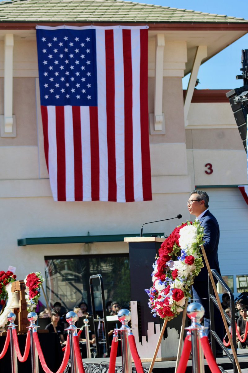 RepVinceFong's tweet photo. Today, throughout our community and across America, we remember the nearly 3,000 innocent Americans lost in the terrorist attacks of 9/11, the first responders who ran toward danger, and the men and women who answered the call to defend our nation.

This morning, I joined our community to gather before a steel beam from the World Trade Center, standing as a lasting reminder of that day—a witness to tragedy, sacrifice, and courage.

“Never Forget” is not just a phrase. It is a promise.

We remember. We honor. We will never forget. 🇺🇸