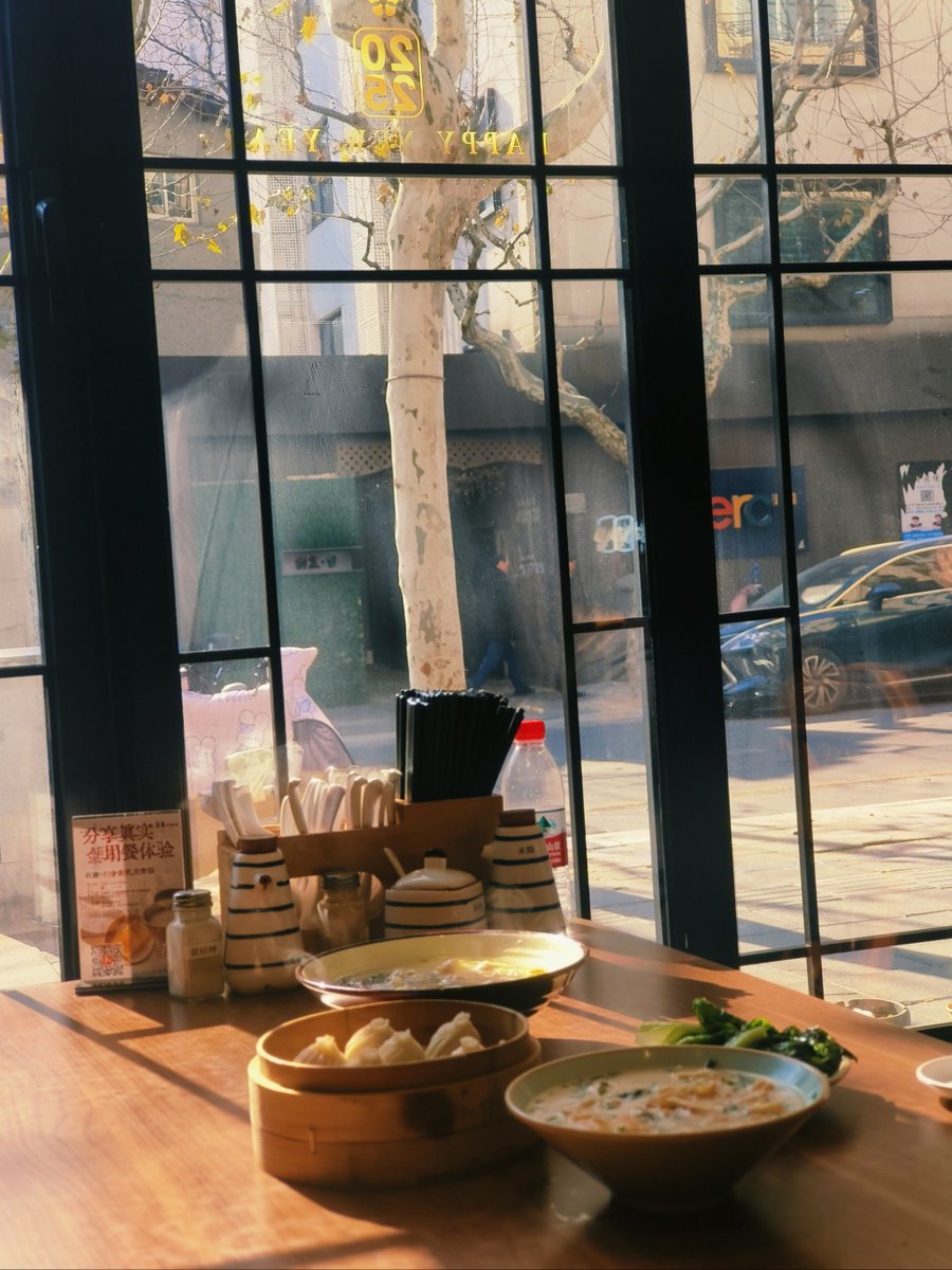 suprememohan's tweet photo. Late night cravings hit. Warm miso soup, soft pan-fried gyoza, and a tiny lamp glowing over wooden tables—this 2AM stall’s not just food, it’s quiet warmth for a tired day. https://t.co/4v8z6MaOaB