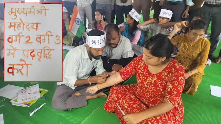 UmangSinghar's tweet photo. शिक्षकों के पद खाली हैं, भर्ती अटकी है और अभ्यर्थी खून से नारे लिखकर सरकार को अपनी पीड़ा बता रहे हैं।

शिक्षक भर्ती 2025 में व���्ग-2 और वर्ग-3 के पद बढ़ाने की मांग को लेकर चयनित अभ्यर्थी राजधानी भोपाल में अनिश्चितकालीन धरने पर बैठे हैं। मजबूर युवाओं ने खून से नारे लिखकर सोई हुई सरकार को जगाने की कोशिश की, लेकिन भाजपा सरकार को न युवाओं का भविष्य दिखाई दे रहा है, न प्रदेश के बच्चों की चिंता।

मोहन यादव जी, जब युवा खून से अपनी मांग लिखने को मजबूर हों, तो समझिए सरकार की संवेदनशीलता कागज़ों में नहीं, कहीं और गुम है। प्रदेश के युवा भीख नहीं अपना अधिकार मांग रहे हैं।
 
@DrMohanYadav51 @udaypratapmp @BJP4MP 
@RahulGandhi @INCIndia @INCMP 

#US12632