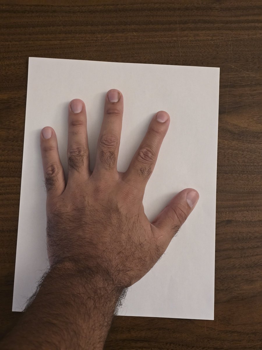 RomanXavier310's tweet photo. My hand takes up a whole piece of printer paper! https://t.co/bK3GLNBPhg