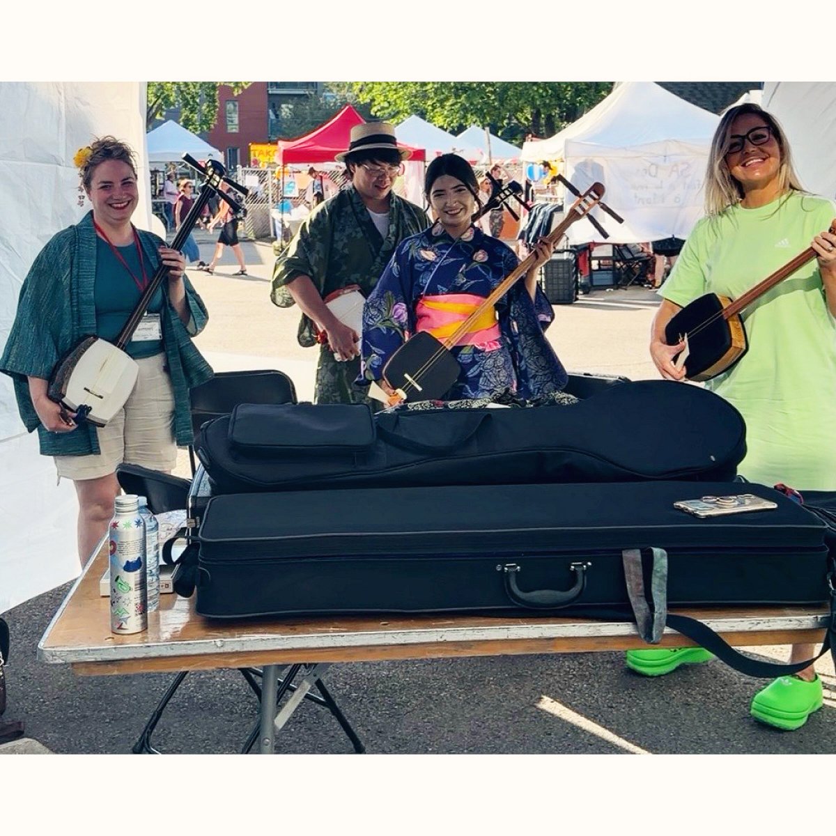 I3onusK's tweet photo. Just took a shamisen workshop, and it was incredible. I play some guitar, but the shamisen is a completely different challenge. Learning with that huge pick was unforgettable. Arigatō gozaimasu, @festivalmatsuri! I’ll be back next year. https://t.co/gEh6jvQL7N