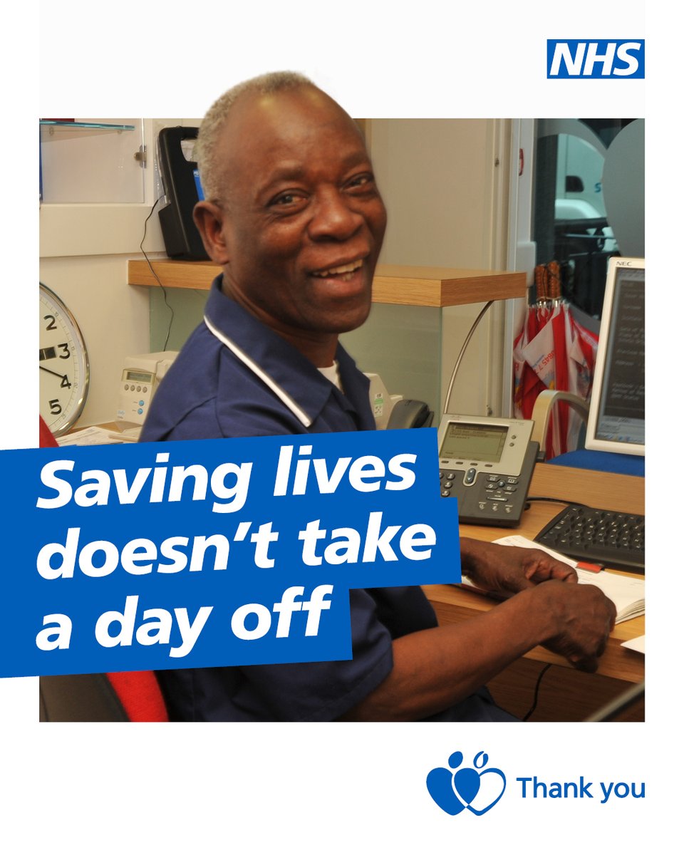 Smiling NHS nurse sitting at a desk with medical equipment, emphasizing dedication to saving lives every day.