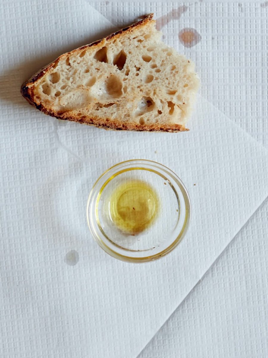LurleneAlituf's tweet photo. Sacred staples: artisan sourdough paired with Palestinian cold-pressed extra virgin olive oil—a heritage-rich combination of airy wild-fermented crumb, peppery notes, deep fruitiness, and centuries of tradition. https://t.co/3XQvfOUtCw