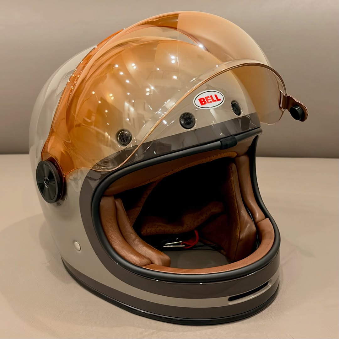 DavidJarosoi's tweet photo. I repainted my bike, so I let go of my dark green SHOEI Glamster “HEIWA MOTORCYCLE” helmet and chose this BELL Bullitt LANE MOCHA to match its new champagne-gold color. Adding a hard-to-find amber-gradient bubble shield with brown tabs gives it an https://t.co/qwNAcSvEYZ