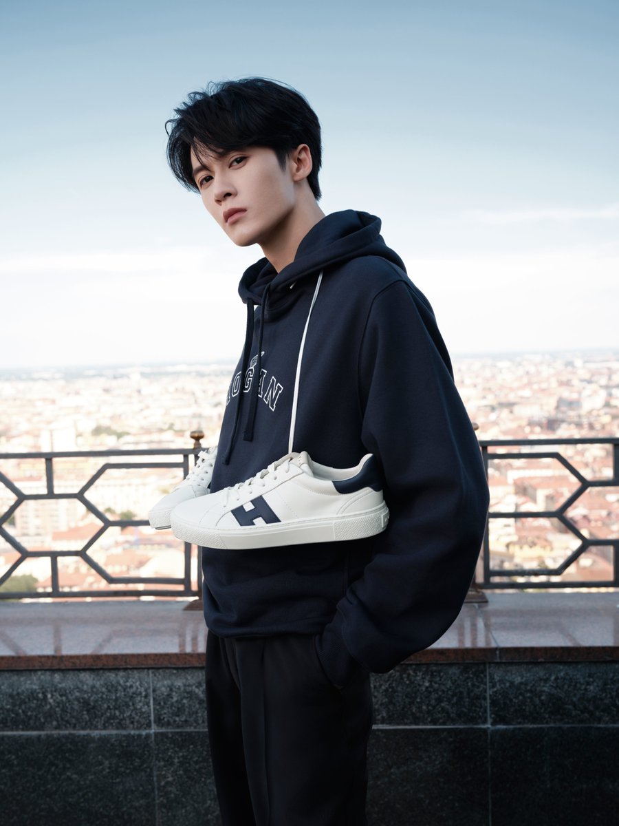 HoganBrand's tweet photo. The campaign stays close to the body, revealing character through posture, movement, and expression. Global Brand Ambassador JC-T 檀健次 TAN JIAN CI
makes every gesture feel entirely his own.  

#Hogan40 #FW26Made to move, born to rise. https://t.co/MAER9xWQib