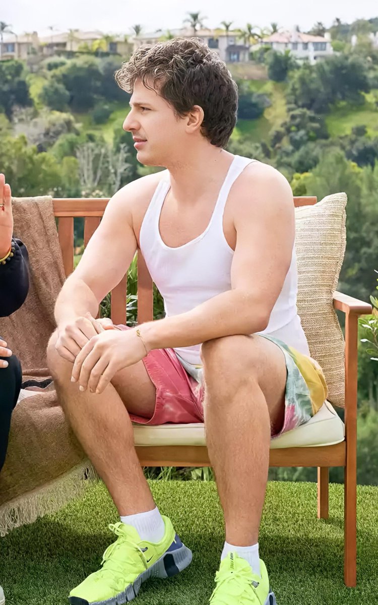 Mossmoviesjo's tweet photo. charlie puth’s 2026 visual language is just: tank top, pits, and emotional availability.

the backyard one is “i have 20 minutes before soundcheck.”
the stage one is “i have already given you everything.”
the sunglasses one is “i have given you too much and i know it.” https://t.co/8OzbDpggcL