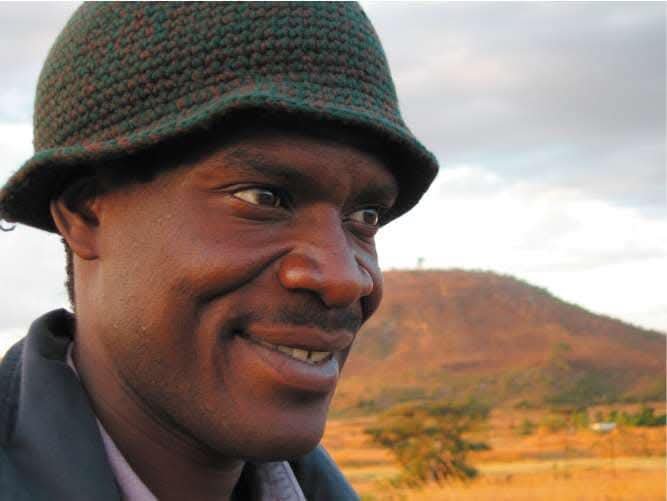 Leokoni's tweet photo. Tonderai Ndira was taken away in broad daylight on May 22, 2008 by about 10 men armed with AK47s. His children saw him get beat. A few days later he was found in a morgue, eyes gouged out, tongue cut off. Who chopped Tonde's head off? Is it a crime to have divergent views? https://t.co/v43xgtBbRq