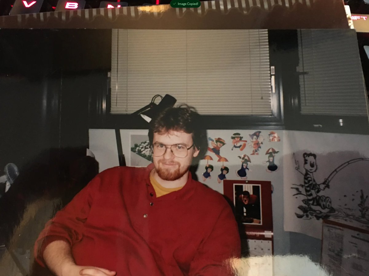 mdf200's tweet photo. With #GTA6 nearing launch, it's worth remembering where it all started.

This first image spawned the first prototype, which in turn helped spawn the second. And the rest as they say.... is history.

You can see a printout of this image, just over my shoulder. This picture was taken while making the prototypes, sometime in 1994. 

#GTA @gtacommunitysol solana:2wMTr4ZttVr5tmS4wLStee59wi8f9QQfMtT2Hoispump
