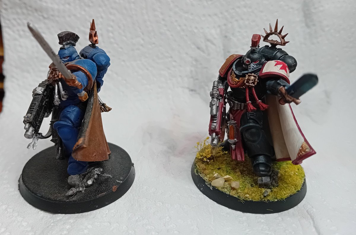 RGrimaldus's tweet photo. The model on the left (Ultramarine) is one I painted many years ago. The one on the right (Black Templar) is one I just finished today. Same model but heaps of improvement! https://t.co/K2NqbGYkPA