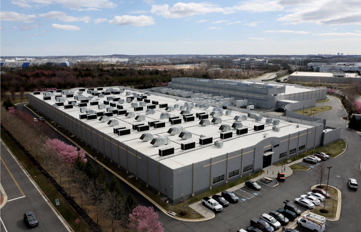 LoneStarLegendX's tweet photo. Why does a 500+ acre data center have a tiny parking lot? 

Because almost no one works there. These sites are not offices or factories. They’re giant machines.

Once built, a hyper scale campus often runs with 50–200 people on site — technicians, security, facilities. Highly automated. Mostly monitored remotely.

The land isn’t for people. It’s for:
- massive power gear
- cooling systems
- security buffers
- future expansion

Construction is the opposite: thousands of workers for a couple years. Then they leave.

That’s why the building is huge and the parking lot looks like it belongs to a dentist’s office.

So, explain to me again why giving up 500+acres for a data center that destroys the resources of the land around them and will only employ 50-200 (mostly H-1B's) is so beneficial we must bow down to them?  

Photo Credit: Reuters, Data Center Knowledge, MIT Technology Review, and Virginia Mercury.