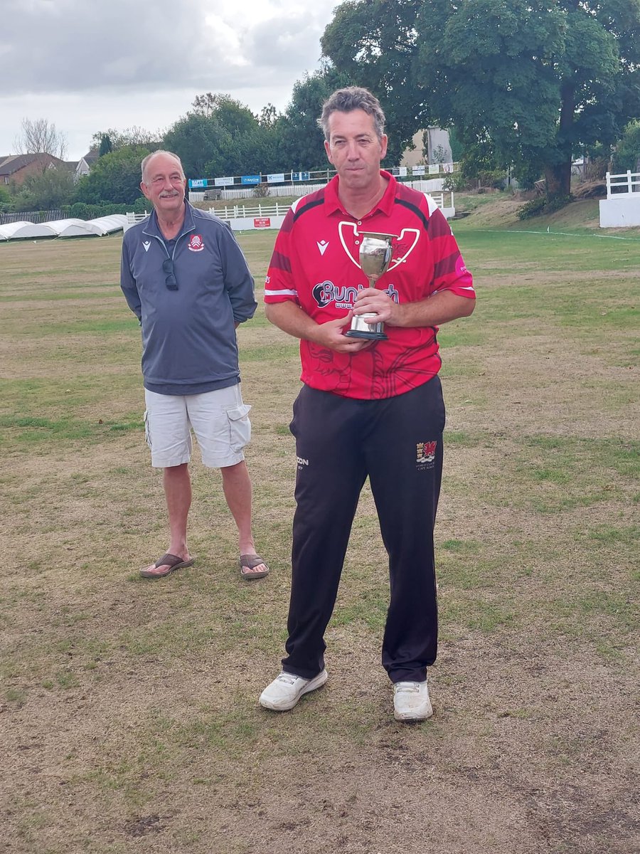 SWJCL's tweet photo. Congratulations to Wales Over 50s on retaining the Russell Davies Memorial Trophy, skipper Matt Phillips receiving the trophy from Russell’s family. Our sincere thanks to Gorseinon CC for hosting another superb day and our main league sponsors Bevan and Buckland LLB. https://t.co/bI1yumgMd1