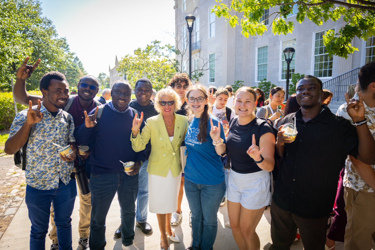 President Genco attends an ice cream social event for the Graduate School of Education.