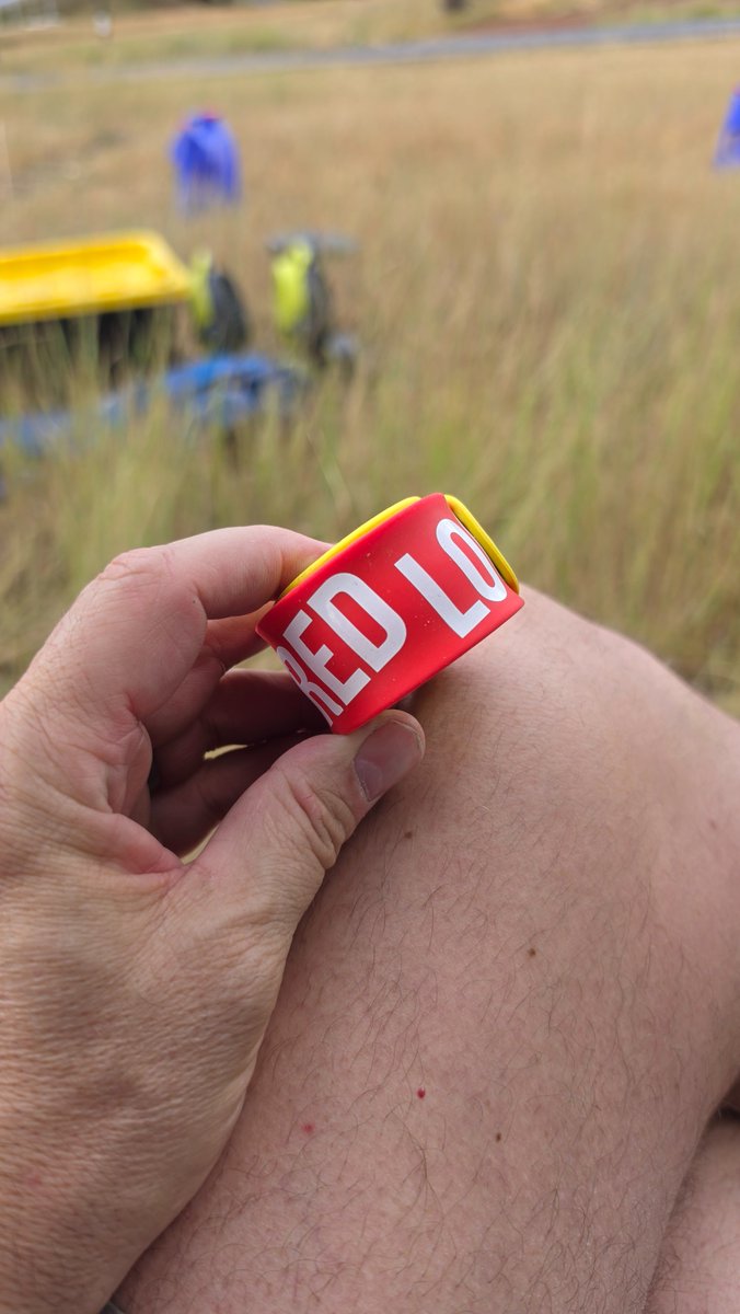 JasonSacredFire's tweet photo. RAGNAR — PART ONE: I DIDN'T KNOW IF I COULD FINISH

Six months ago, give or take, my wife Jennie sent an invite out to our tribal chat group. She wanted to form a team of eight to run the Ragnar Trail Race at Soldier Hollow in Midway, Utah. Strangely, I was one of the first to respond. Yes. I'll do it. I don't even remember typing it. 
That's unusual in our marriage, by the way. I'm normally the guy who says "Hey, I have an idea, let's get everyone together and do this insane thing," and Jennie is the extraordinarily competent human who turns my ridiculous ideas into reality. This one was hers, start to finish. She asked the tribe who wanted in, and the first person to say yes was, apparently, me. She still can't quite believe it.
Eventually we had eight runners: Eli, Jennie, me, Aubrey, Riley, Amethyst, Jade, Porter. Then, four days before the race, Jade tweaked his knee hard on a downhill training run. Out. His brother Caleb got the call — "Can you run Ragnar in four days?" — looked at his calendar, and said yes. And we had eight again.
There was one slight problem. I couldn't really run. Ten years ago I could do the one-mile hill loop by my house in about eight minutes. Now it's sixteen. My lungs complain, my hips hurt, and uphill running absolutely murders me. I'd "trained" through most of the summer in the loosest sense of the word — life kept interrupting — and I didn't get serious until about four weeks out.
And somewhere in that final stretch, something else showed up that neither of us expected. About a week before the race, Jennie and I both went quietly, unexplainably low. Not anxious about the race itself — there was no logical thread connecting the dread to anything specific. Just a flatness, a heaviness, the kind of low you can't argue your way out of because it isn't attached to a reason. We'd later name it what it was: some kind of pre-race depression, chemical and strange, that lifted the moment the race actually began. But in the week leading in, it was real, and it was confusing, and we just had to sit in it.
Which is how I found myself, four weeks before Ragnar, halfway up the infamous Red Loop on a test run, climbing nearly a thousand feet in about two miles, thinking: there is no way. So I turned around. Not dramatically. My body simply said you cannot do this, and it was right — at least that day.
Instead of treating that failure as proof I shouldn't do Ragnar, I treated it as information. I'd been training with a man named Jesse Elder around this exact idea — that failure isn't a verdict, it's data — and for the first time, I actually rewrote the program running in my head. I started training differently. More hills, more dirt, more time outside instead of my treadmill.
A couple of weeks later, six of us went back. This time we finished Red. It took Jennie and me four hours to cover about seven miles, partly because the final stretch of trail hadn't actually been built yet — we were bushwhacking through scrub oak, following GPS coordinates for a trail that didn't exist. But I finished. Then Ragnar's new ownership finally cut the real trail and shortened Red to about five miles, and suddenly I knew something I hadn't known before: I can do Red.
That became my entire strategy. Not "I'm going to crush this." Not "I'm finishing all three loops." Just — I know I can do Red. If that's all I've got, fine. We'd find out the rest afterward.
Thursday afternoon we built camp beneath a huge pine tree in an aspen grove. Friday morning our team ate breakfast together. At seven, Eli took off and absolutely smoked Green — for about seventeen glorious seconds, Team Trail Wubs may have been in first place. Then Jennie went out on Yellow. She'd broken in brand-new, wildly expensive racing shoes just days earlier — after a nineteen-mile training run the previous Sunday, five days before the race, in the same shoes. Not the wisest sequencing, and her calves let her know it; her Yellow loop turned into a real fight with pain she hadn't planned for.
Then they called me. I stepped into the transition tent wearing a ridiculous tie-dye shirt I'd made myself, my whole team screaming behind the fence. I bolted around the first corner and almost immediately my hips seized up and I couldn't breathe. Five miles of mountain ahead of me — including the exact climb that had already beaten me once.
Well. Here we fucking go.
