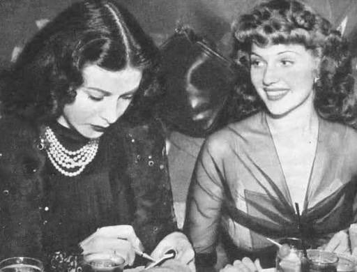 PetronellaWyatt's tweet photo. Even “love goddess” Rita Hayworth can’t keep her eyes off Hedy Lamarr at a ball held by Marion Davies in 1942. Lana Tuner, who could be catty about other women, once said: “None of us could hold a candle to Hedy. Sometimes she would attach a single diamond to her forehead and go to a restaurant or a nightclub for dinner. When she entered the room there was utter, I mean, utter silence for about five minutes. The men just fainted.”