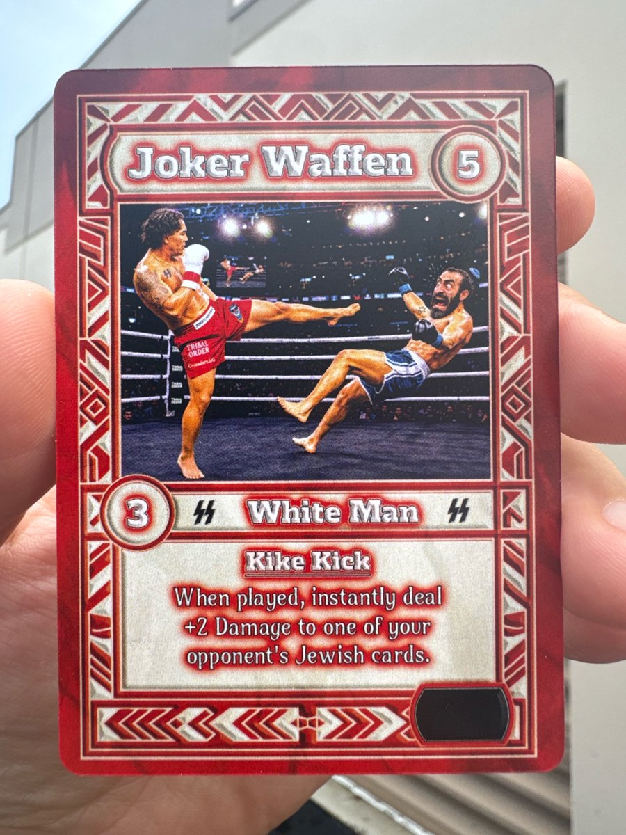TribalOrdergame's tweet photo. You guys know we had to make a Victory Card for our brother @jokerwaffenfren 

He went straight into the lion’s den of ghetto ass Orlando, Florida, to whoop some lying, delusional jew's ass, and it was glorious.

Salute to Paul for being such a warrior for our movement!

This card will only be available for only 24 hours, until tomorrow at 5 PM ET on https://t.co/VSvaSuG5Hw

As always, every Legendary card is automatically registered, allowing you to buy, sell, or trade it in the future with full authentication. Each card comes sleeved and secured inside a magnetic protective case.

A very limited number of orders will be randomly upgraded with an exclusive holographic version of this card.

Please allow up to one week for your order to ship. We are a small American company, and every card is manufactured in-house.

https://t.co/VSvaSuG5Hw