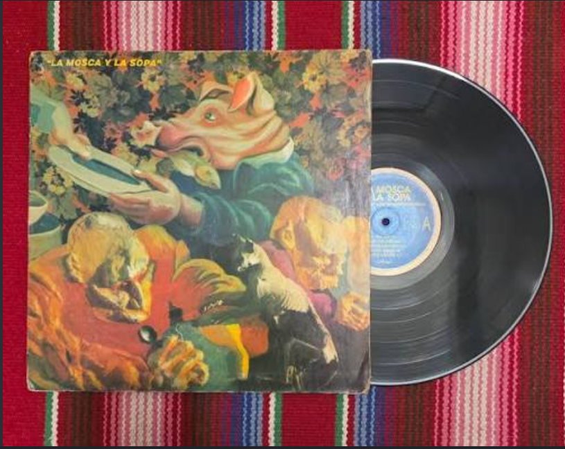 pluscoamperfect's tweet photo. @CarlangasOK En la Mosca y la Sopa la versión CD tenia una tapa totalmente diferente a la del vinilo https://t.co/FohPfDU2PN