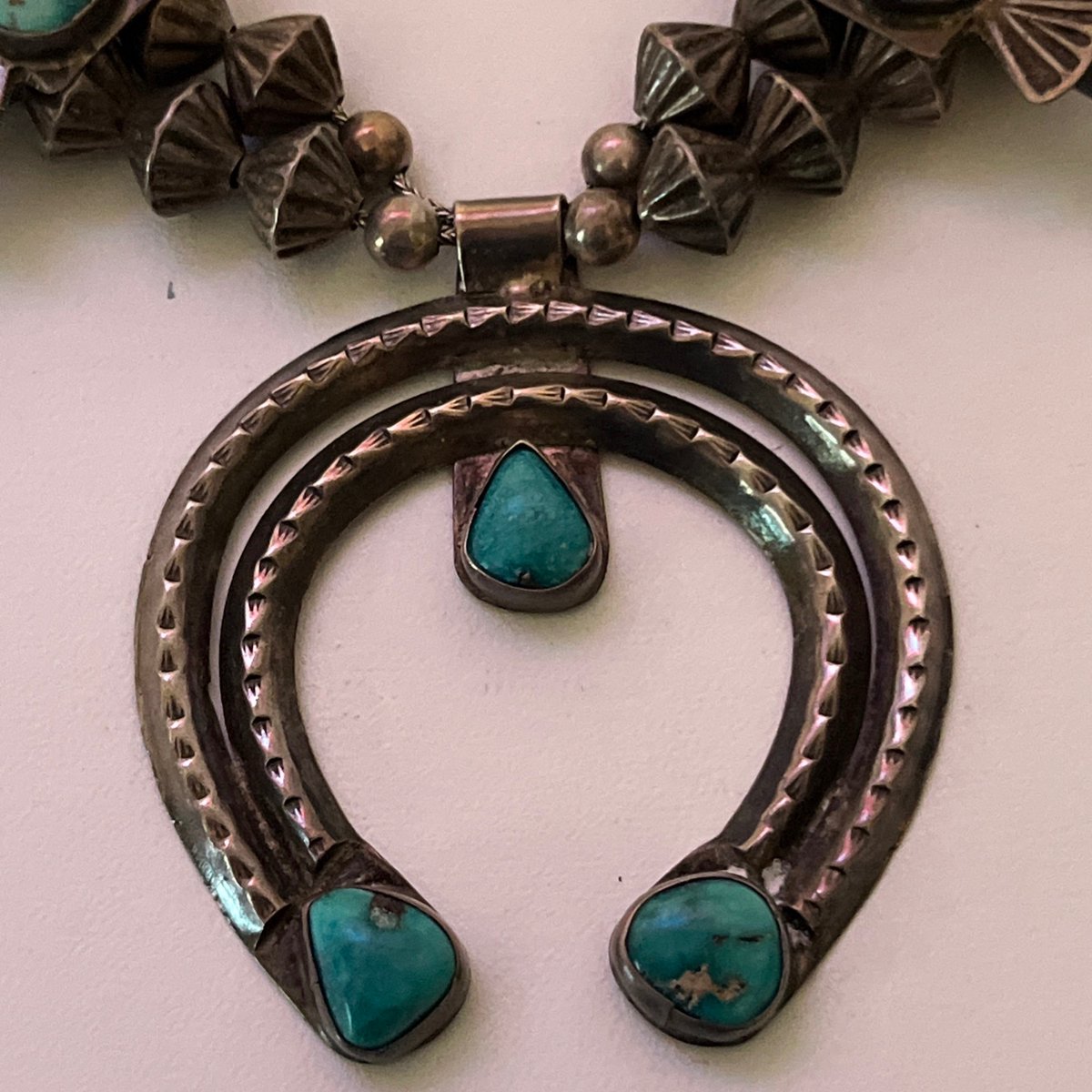 Danno561's tweet photo. 1940’s Handmade Box Bow Squash Blossom Necklace with Blue Gem Turquoise from Nevada #turquoise #jewelrymaking https://t.co/ONnt8w25ia