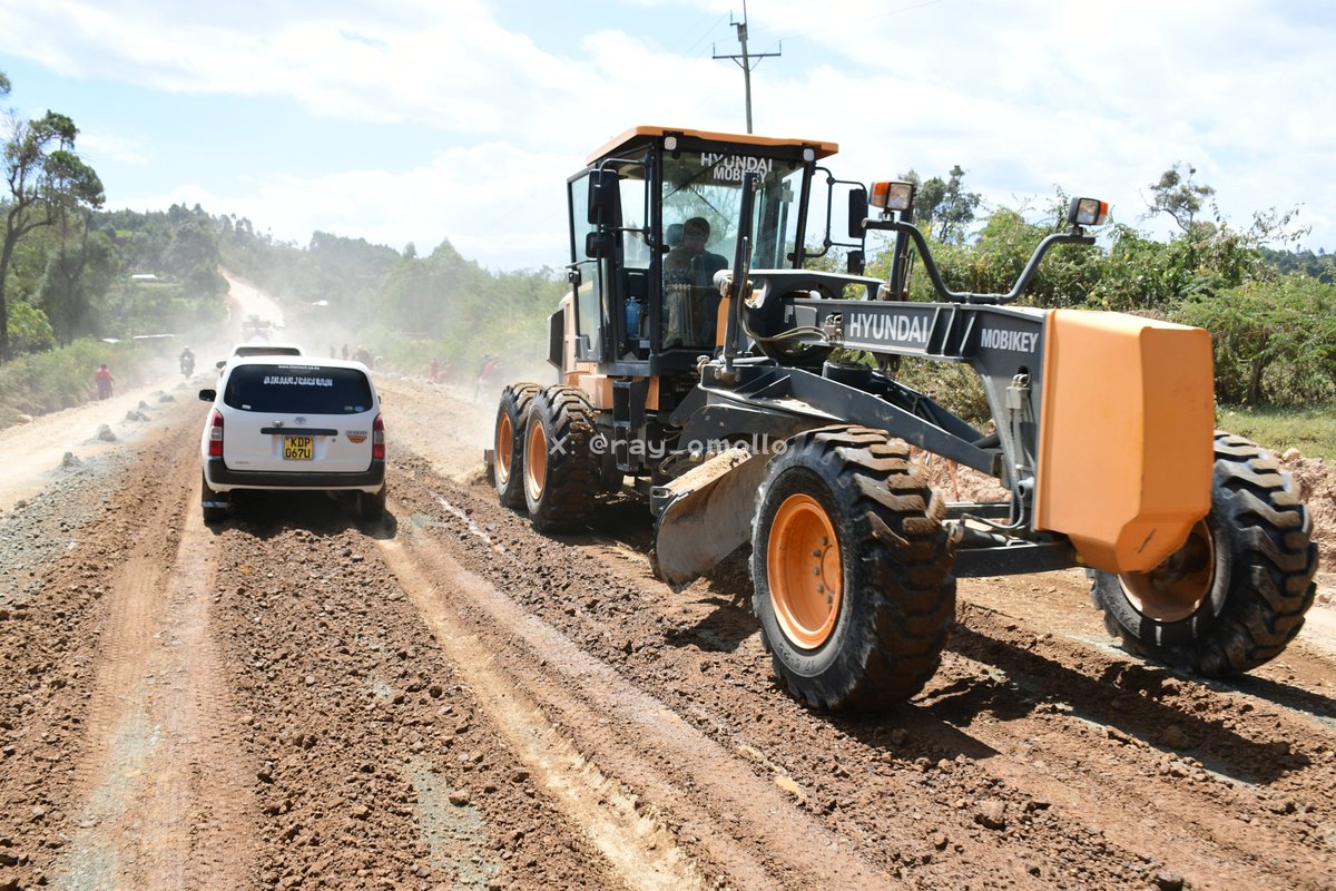 ray_omollo's tweet photo. 'Dust is constant' is a philosophy we are not carrying into the conversation on Kenya Beyond Vision 2030. Across Narok, roads are being transformed from dusty, impassable routes into reliable arteries of development. 

The Ololunga–Sogoo–Saptet–Mulot Road is nearing completion, with 22 kilometres already paved to bitumen standards under the supervision of the Kenya Rural Roads Authority (KeRRA) and funded by the National Government.

The road is part of a larger multi-link rural network spanning 78 to 81 kilometres, connecting communities across Narok South, Narok West, Kilgoris and Emurua Dikirr, opening up fertile agricultural zones and easing the movement of farmers and their produce. 

The improved corridor will link rural production centres to markets such as the newly operational Ololulunga Modern Market, strengthening trade in maize, wheat, vegetables and dairy products.

Through the State Department for Internal Security and National Administration, the Government is supporting infrastructure that brings communities closer to markets, services and opportunities.