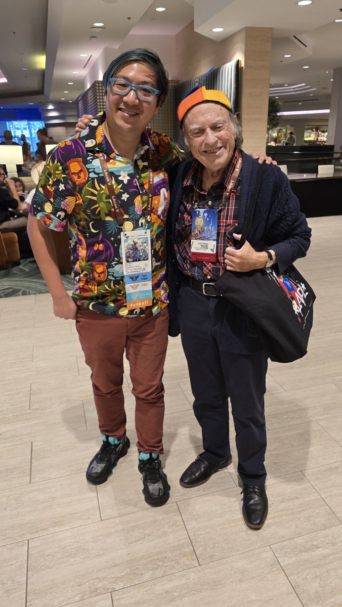 ConHistory's tweet photo. Very awesome to see our friend John Hertz - super fan, LASFS member, and Big Heart Award winner, wearing an authentic Ray Nelson made propeller beanie! We met John last year at Worldcon and he made us feel welcomed, explain old fan history to us, and later sent us a nice letter. https://t.co/5FsOWWz2gm
