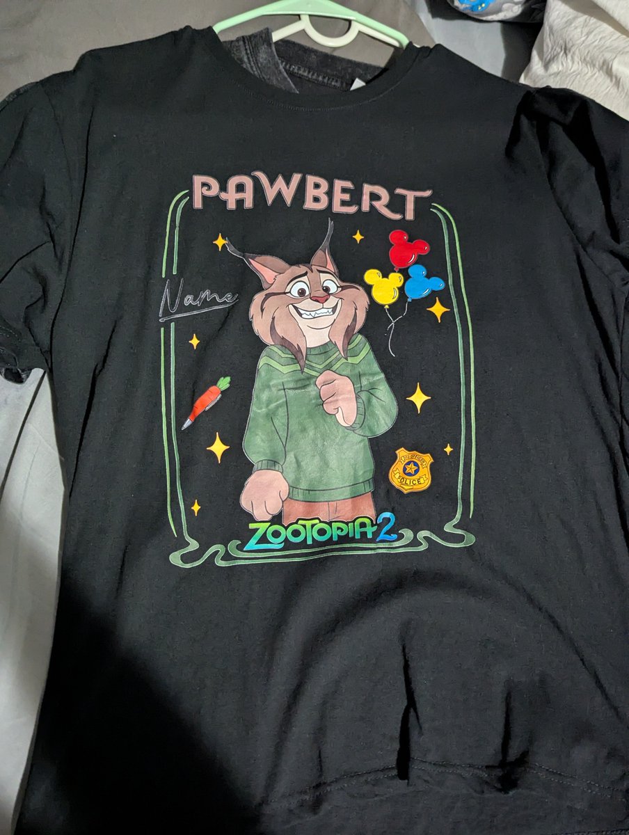 Ron_Foxcoon's tweet photo. My mom was so sweet to get me this cute shirt of Pawbert. She got it from SHIEN and it's has it's flaws like it randomly saying "Name" on the left there but I DON'T CARE IF IT'S BOOTLEG!! I'm desperate for Pawbert merch and it was really sweet of her to do this! I'm wearing it! https://t.co/gPdXRHgPFl
