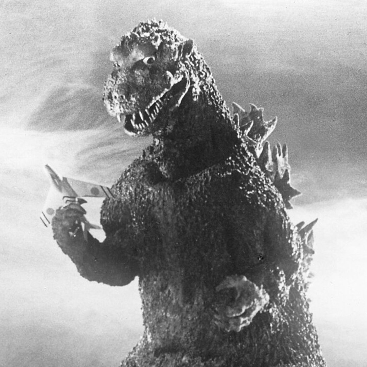 Dexerto's tweet photo. Godzilla is getting its own premium limited-edition watch with only 1,954 available to mark the year the first film was released in Japan https://t.co/4an9J8lr6Q