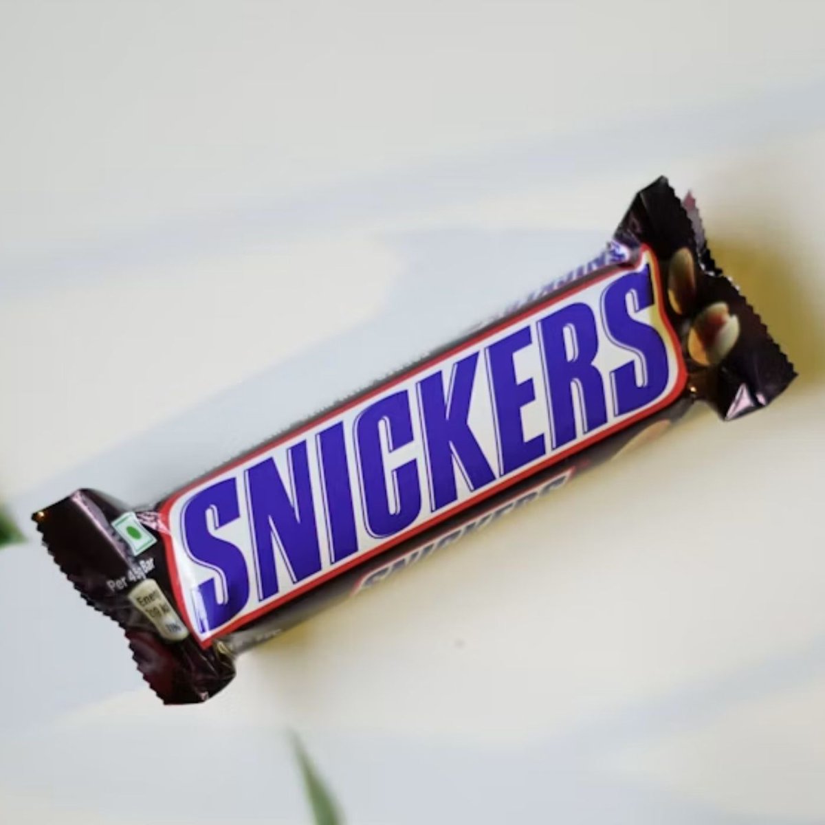 Dexerto's tweet photo. Snickers has made a digital candy bar you can “feed” to AI when it starts giving bad answers

The HungrAI bar prompts the chatbot to rethink its response https://t.co/P0rslcbROJ