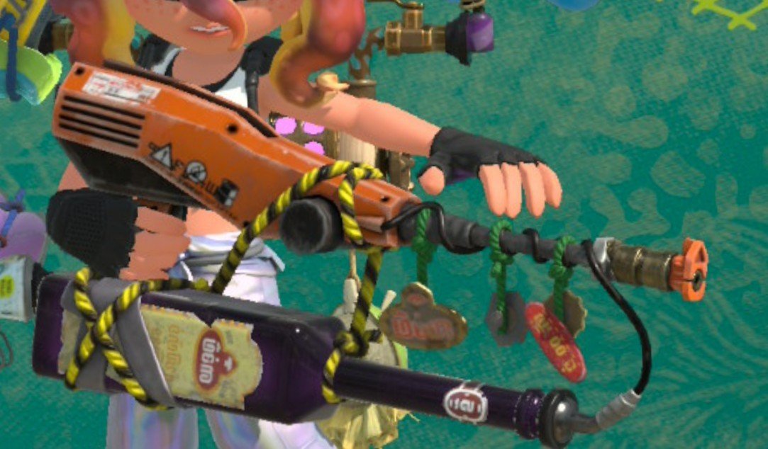 SwitchySh4rky's tweet photo. I really hope the splatoon raiders weapon accessory details were tests for future features in splatoon 4!!

Imagine if we could freely customize our weapons with stickers &amp; charms...👀 https://t.co/c8oCnPY71h