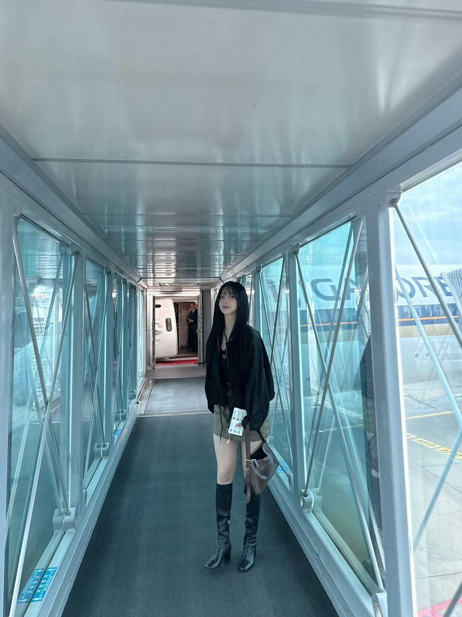 Kapin's tweet photo. Walking down the boarding bridge like it’s my personal runway! ✈️ https://t.co/RPSiUopyK9