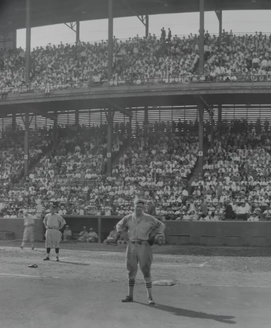 CardsManager's tweet photo. An elderly woman was severely stunned when a youth behind her plied a tightly rolled newspaper on her head in the heat of excitement as Les Bell knocked his homer in the first game, third inning. Pictured: Third baseman Les Bell https://t.co/v6bbEYsGwg