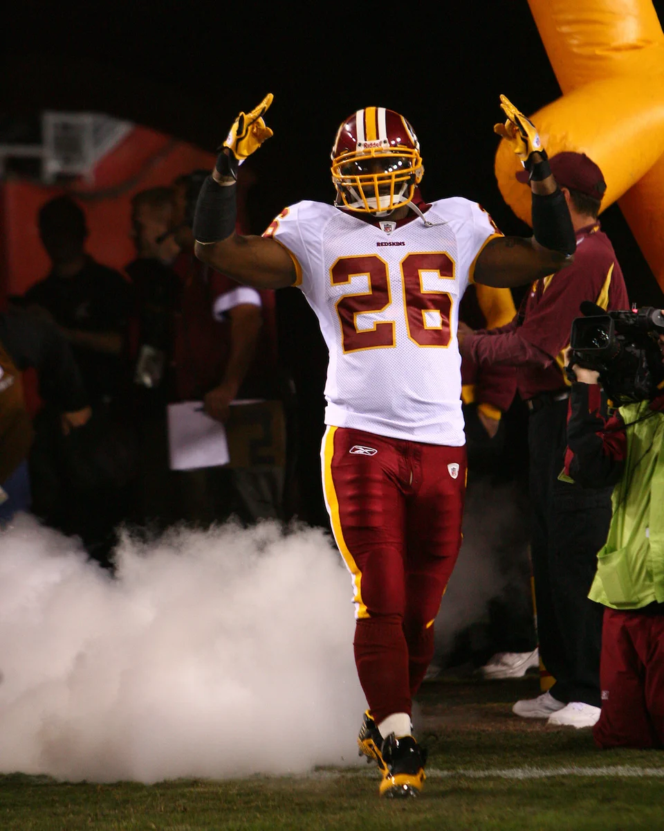 Photo of Clinton Portis running out of the tunnel.