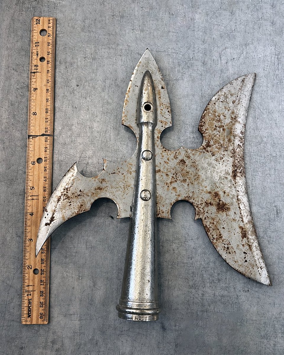 TSA's tweet photo. What if you went to the airport &amp; just didn’t bring *checks notes* a medieval halberd in your carry-on bag? https://t.co/lMuh3vBQKA