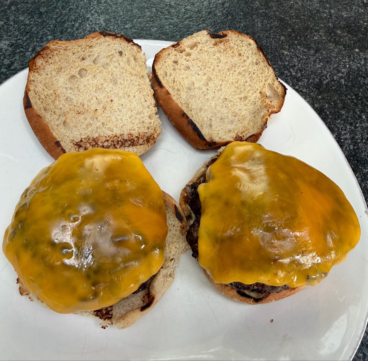 BarstoolBigCat's tweet photo. I hope the younger generation sees what hard work looks like. Set a goal. Accomplish that goal. Summer of Burgers https://t.co/cUeXmt7hEn