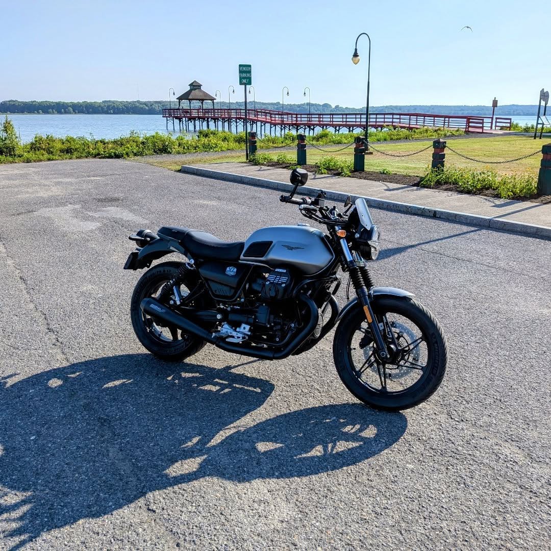 AndrewKlebvi's tweet photo. Finally got my 2023 Moto Guzzi V7 Stone, Megatron aka Deer Slayer, exactly where I want it: comfort seat, sport fairing, grab handles, bar-end mirrors, tank protectors, OEM engine guards, short slip-ons with DB killers removed, and an UpMap T800+ https://t.co/RamsOIimxG
