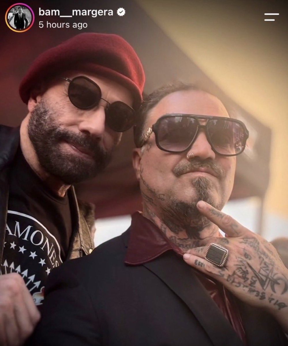DaveMcNamee3000's tweet photo. An important photo of John Travolta in a beret with Bam Margera was just slid across my desk in a manilla envelope https://t.co/FQnSb1oCT6