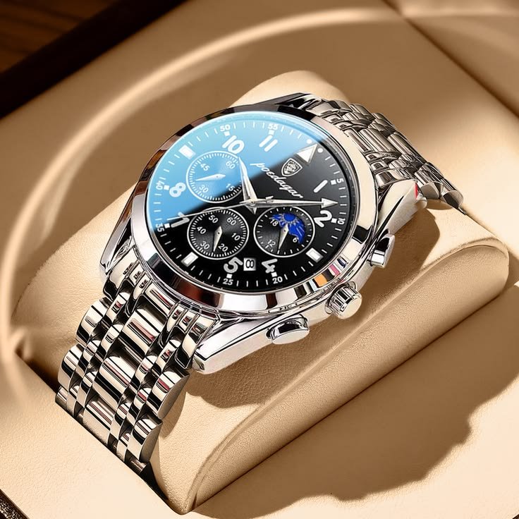 cco_ol's tweet photo. Create a 10-second vertical 9:16 luxury fashion watch commercial using the provided watch image as the exact product reference. Keep the watch’s dial design, silver metal bracelet, colors, proportions, branding, hands, sub-dials, and overall appearance perfectly consistent throughout the video.

Scene: A young, handsome, stylish man wearing a perfectly tailored black suit with a black waistcoat and crisp white shirt stands inside an elegant luxury interior. His face is natural and sophisticated, with a confident masculine expression.

0–2s: Cinematic medium shot as he adjusts his black suit jacket and waistcoat. Warm luxury lighting creates subtle highlights on his outfit.

2–4s: Camera smoothly moves toward his left wrist as he naturally adjusts his cuff, revealing the luxury watch. The polished silver bracelet catches the light with realistic reflections.

4–7s: Extreme macro close-up of the watch on his left wrist. He slowly rotates his wrist toward the camera, beautifully showcasing the dial, chronograph details, metallic bracelet, and premium finishing. Add elegant light reflections across the glass and metal.

7–9s: Slow-motion hero shot — he confidently places his left hand near his suit jacket, subtly showing off the watch while maintaining a sophisticated pose. Shallow depth of field, luxurious background bokeh.

9–10s: Final close-up of the watch with a smooth cinematic push-in, dramatic highlight across the bezel and crystal, ending on a premium luxury-product frame.

Visual style: Ultra-realistic luxury fashion campaign, premium watch commercial, cinematic photography, sophisticated masculine aesthetic, warm studio lighting, realistic skin texture, realistic fabric, physically accurate metal reflections, shallow depth of field, smooth camera movement, subtle slow motion, HDR, ultra-detailed, high-end advertising quality, 8K, photorealistic.

Camera: 50mm cinematic lens, macro lens for watch shots, smooth dolly movement, controlled focus pulls, realistic motion blur, crisp product details.

Important: The watch must remain identical to the reference image. No redesign, no distorted dial, no changing numbers, no extra buttons, no warped bracelet, no duplicated watch, no floating accessories, no text changes. Natural wrist movement and realistic watch placement.

Negative prompt:

distorted hands, extra fingers, deformed wrist, duplicate watch, changing watch design, warped bracelet, incorrect dial, blurry product, fake reflections, plastic-looking metal, unrealistic skin, face distortion, flickering, jitter, sudden camera movements, low resolution, cartoon, CGI appearance, oversaturated colors.