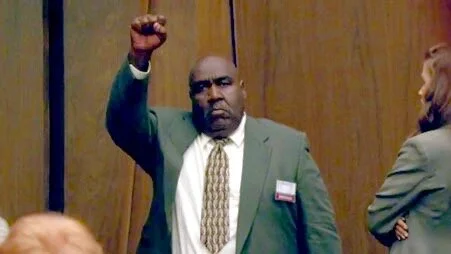 JackPosobiec's tweet photo. Did You Know:

A Black Panther lied his way onto the OJ jury and raised a Black Power fist in the court after the Not Guilty verdict 

This is how he was depicted in the docudrama: https://t.co/gmRRBACS28