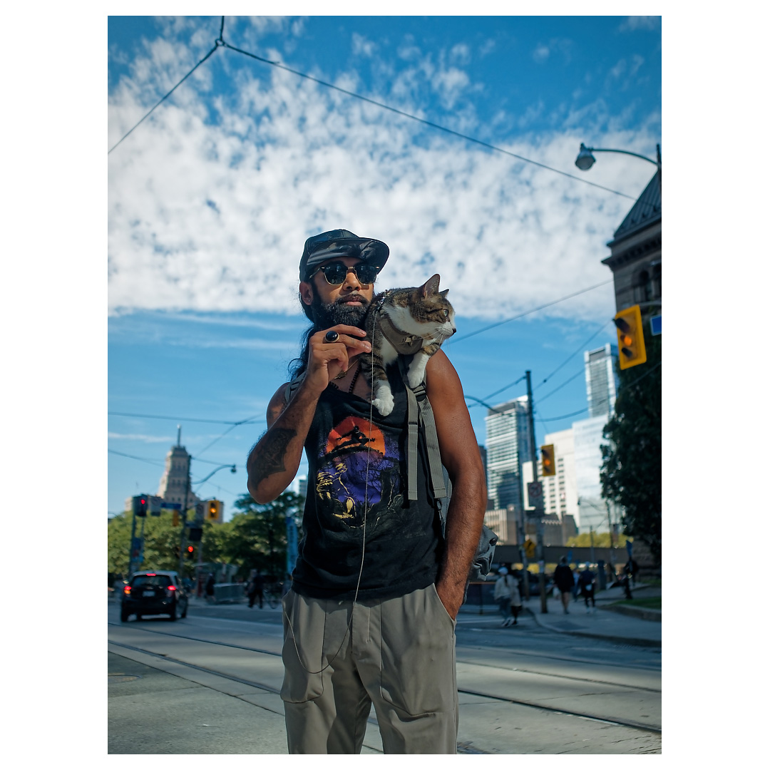 GuyArnotta's tweet photo. Sid &amp; Weasel 
Queen St. W 

What a cool duo. We spotted them on Bay St. and ended up having an impromptu portrait session. Weasel was increasingly unimpressed with every shutter click, but Sid patiently put up with all five of us snapping away. https://t.co/01zp1lksqH