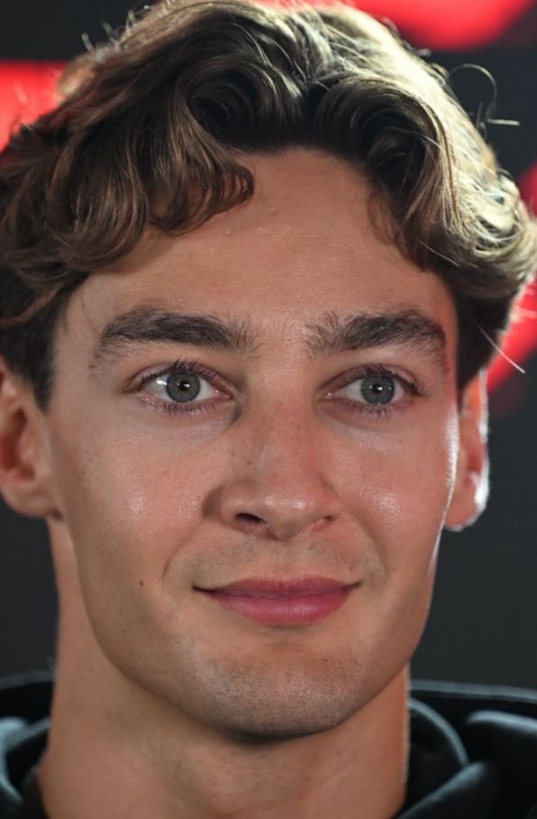 chrysqlismm's tweet photo. showed my roommate a picture of george russell and she said he looks like my cat?? https://t.co/xPhWZWsDFq