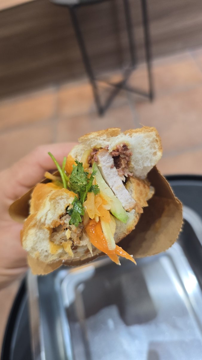 voloships's tweet photo. Finally Hanoi.

It is the place to eat some of the best Bahn Mi in whole Vietnam.
Bánh Mì is a "must" for everyone visiting Vietnam.

My top combo is traditional loaded Hanoi Bahn Mi (3 pork meats: pate, charsiu and sausage, greens, pickles and sauce) with extra pickles + cold Kumquat Tea (ask less sweet).

All is just 50 VND (about 1.7 EUR) almost in old quater area is a steal!

Grab the place: https://t.co/BTJUseMnsd