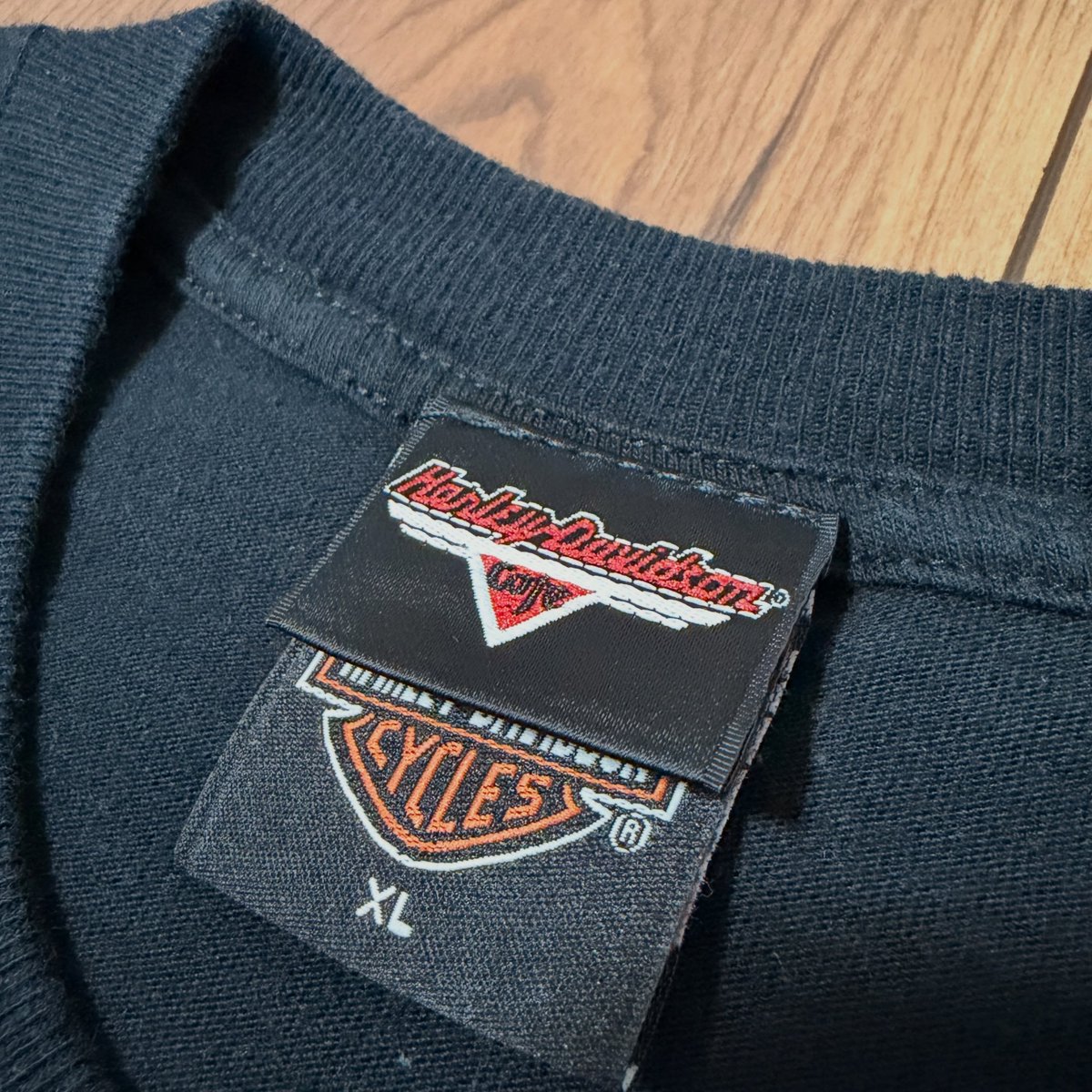 TandraSojo's tweet photo. Official vintage pocket T-shirt from the former Harley-Davidson Cafe Las Vegas in Nevada. Front: A vivid blue flame graphic and “Harley-Davidson Cafe LAS VEGAS” logo on the chest pocket. Copyright 1998. Back: A traditional touring model, likely a https://t.co/VVp4jk9QOU
