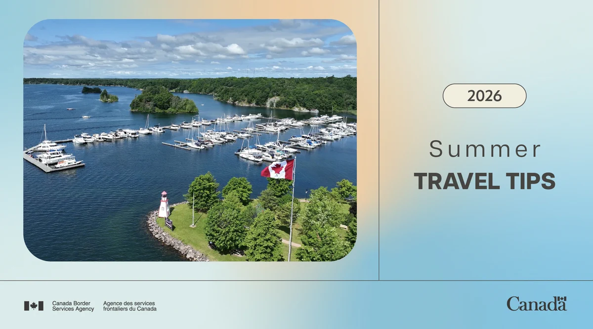Aerial view of a marina surrounded by green islands, with boats docked along the shoreline, a Canadian flag and a small lighthouse in the foreground. The graphic reads “2026 Summer Travel Tips” and includes the CBSA and Government of Canada wordmarks.