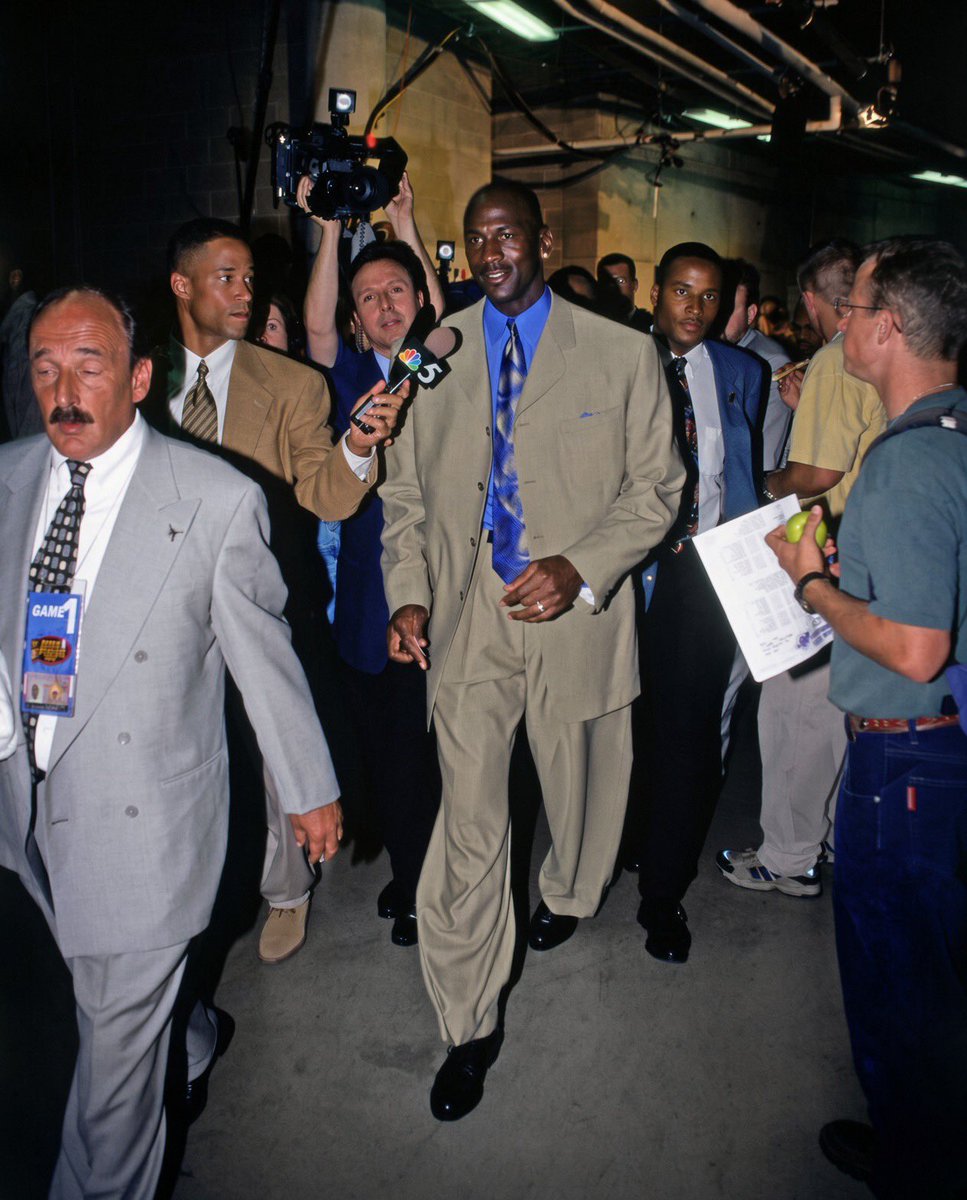 AthleteVanity's tweet photo. No one was moving this way in a suit in the late 90s and early 2000s https://t.co/X2zeCI6xtH