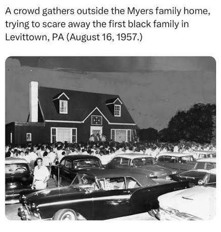blackJournals01's tweet photo. America's most famous suburb sold 17,000 houses with a whites-only rule. When one Black family finally bought in, a mob laid siege to their home for WEEKS.

Levittown. The mass-produced postwar dream — built with federal backing under exactly the lending doctrine we showed you this morning. Its developer was open about the policy: the company would sell houses to white families, and racial progress was somebody else's business.

August 1957: William and Daisy Myers, a veteran's family, bought a house in Levittown, Pennsylvania.

The response: crowds of hundreds outside their windows night after night. Rocks through the glass. Crosses burned. A house next door converted into a harassment clubhouse, Confederate flag flying, music blasted at all hours.

The Myers family wasn't attacked because they had done anything wrong. They were attacked because they dared to live where they had been told they didn't belong.

And the violence didn't come from some distant past. It happened in a neighborhood built around the promise of the American dream.

This is why our book  documents up to 150 cases of racial violence, intimidation, injustice, and crimes that were never truly answered for.

They wanted these stories forgotten. We chose to document them. Get yours https://t.co/V6OJtazidd