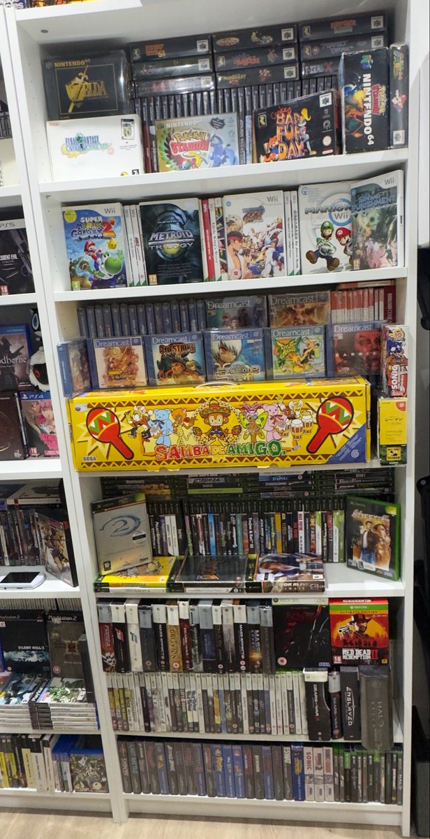 FrizzyEZ's tweet photo. My updated game collection https://t.co/V8ZOlkweRU