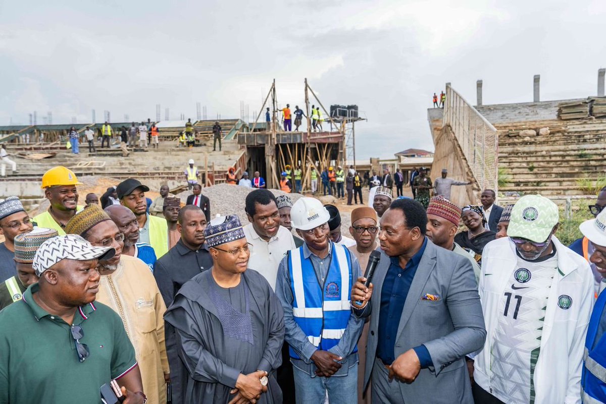 UbaSaniMedia_'s tweet photo. Governor Uba Sani was joined by Nigeria’s football legends, including Daniel Amokachi, Garba Lawal and Emmanuel Babayaro, for an inspection of the ongoing reconstruction of Ahmadu Bello Stadium (ABS), Kaduna.

The FIFA-standard stadium will feature a 33,000-capacity bowl, up from the initial 16,000 capacity, a hybrid turf (one of its kind in Nigeria), rehabilitated training pitches, a gymnasium, a modern media centre and an athletes’ hostel.

Governor Uba Sani said the project will restore Kaduna’s historic sports legacy. He has also fulfilled the 30-year-old promise of land allocation and street naming in honour of the Atlanta 1996 Super Eagles.

#WorkingForKaduna