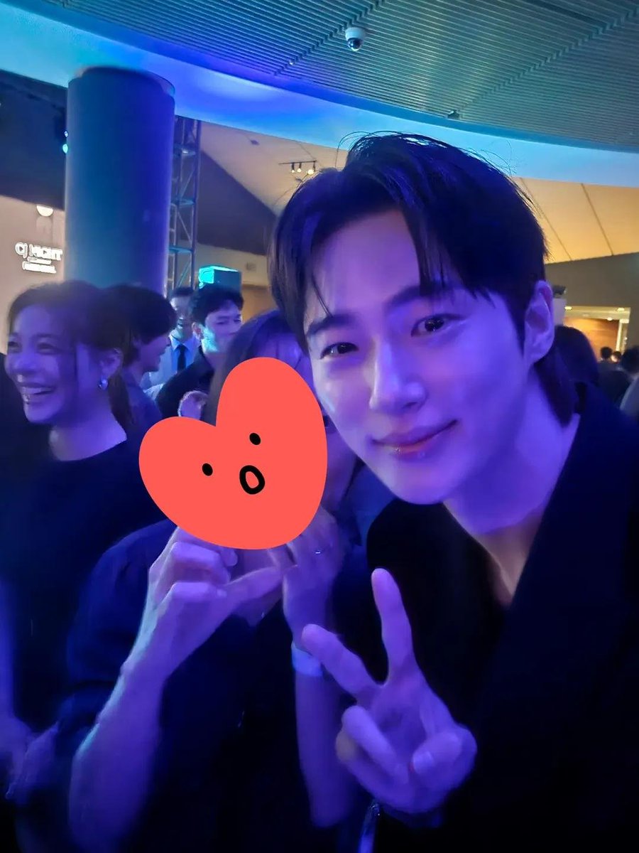 byeonwoonist's tweet photo. a lucky TTE met wooseok, took photos together, and got his autograph at today's event! 😭

"i've officially become a successful fan… 🥹 
wooseok came to the place where i work

with my hands trembling, i told him "i'm actually working here, and i'm a huge fan of yours" and showed him my phone case with confetti on it. he immediately recognized it and happily said "oh, you're a TTE!"🥹💛

my hands were shaking so badly when i asked him to take a photo with me, but he did.. when i showed him that i had photos of wooseok as my phone and smartwatch wallpapers, he burst out laughing ㅠㅠㅠㅠ 😍🫠

my hands were shaking so much that he reassured me saying "it's okay" and gently comforted me.. he even signed my phone case.. 🥹

he looked me in the eyes while talking to me, and i couldn't even tell if i was dreaming or not. my mind went completely blank, so i just kept repeating, "i'm a huge fan"  like a broken parrot ㅠㅠㅠㅠㅠ

after that, every time we crossed paths, he would greet me. and when i was standing around awkwardly by myself, he looked at me and asked, "Why are you wandering around all by yourself?" ㅠㅠ when i told him i couldn't go home bc he was still there, he laughed so much ㅠㅠ when i told him "good luck with your japan fan meeting!" he bowed and greeted me againㅠㅠ ah.. 🫠

mhy dream came true.. wooseok recognized me.. 😍🥹😍 i'm genuinely so happy.. i'll bury my bones at this company forever ㅠㅠ 💙"

WHAT A CUTE INTERACTIONS 😭😭😭