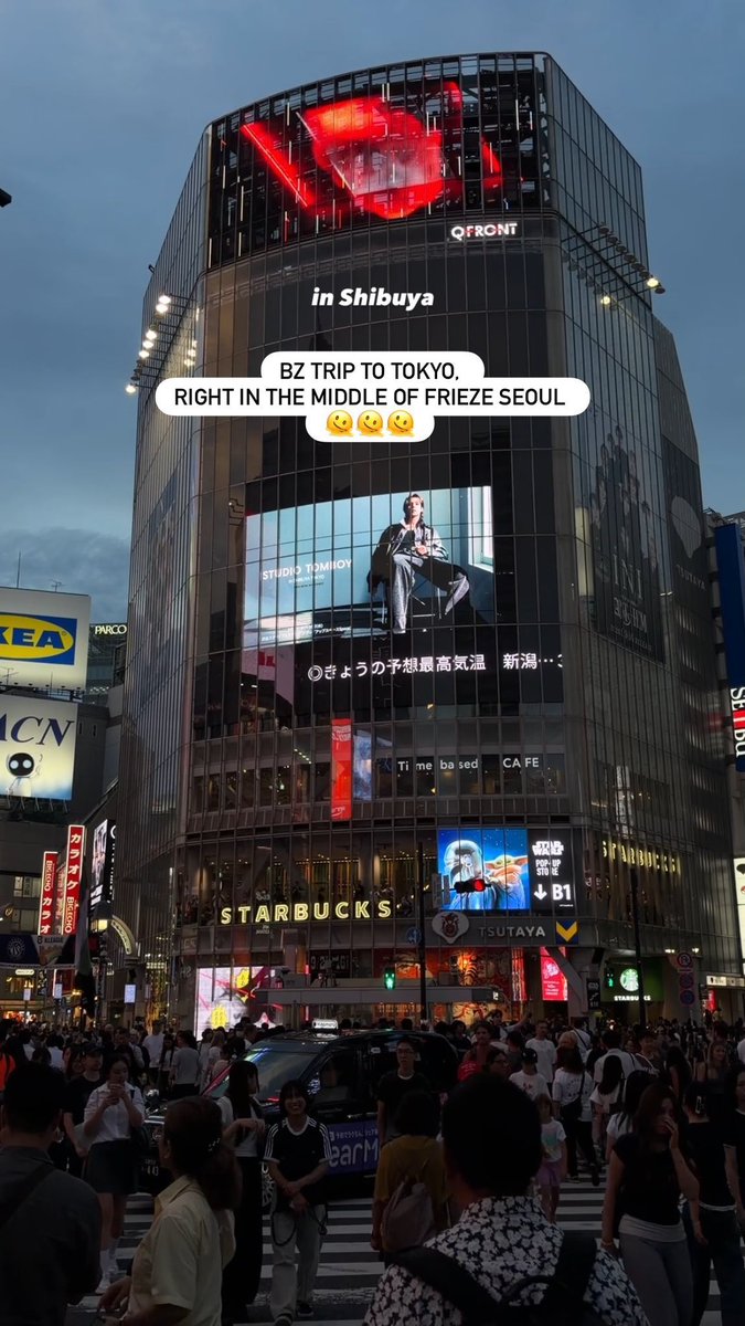 hrtsjung's tweet photo. you mean to tell me that wooyoung’s billboard for studio tomboy is flashed around here in shibuya???????? https://t.co/MxBXgBKbwU