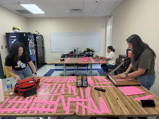 NISDElemMath's tweet photo. Shoutout to our incredible PACK! 🐾 The Fernandez Elementary parent and community volunteer group, the Pack Partners, are hard at work prepping materials for upcoming Bluebonnet lessons.  Thanks to the school community for helping out!📚✨ https://t.co/VIvZforxag